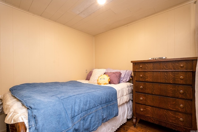 375 Goshen Ave, North Little Rock, AR 72116 - bedroom featuring dark wood-style flooring and a decorative wall