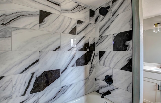 bathroom view of vanity and shower / bath combination
