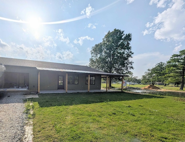 1108 S Dodd St, Rector, AR 72461 - rear view of property with a lawn and a porch