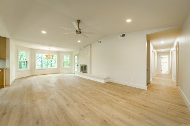 9008 Leatrice Dr, Little Rock, AR 72227 - unfurnished living room with a ceiling fan, light wood-type flooring, baseboards, recessed lighting, and vaulted ceiling