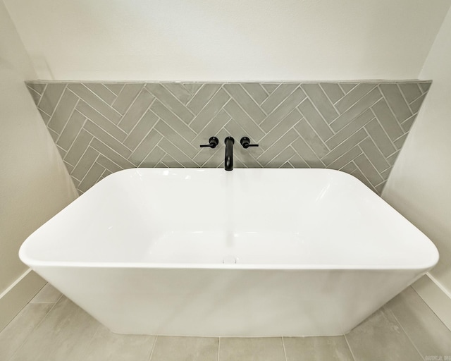 9008 Leatrice Dr, Little Rock, AR 72227 - detailed view of a soaking tub and baseboards