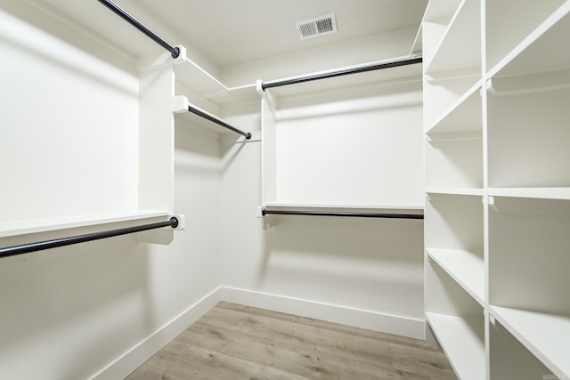 9008 Leatrice Dr, Little Rock, AR 72227 - walk in closet featuring light wood-type flooring