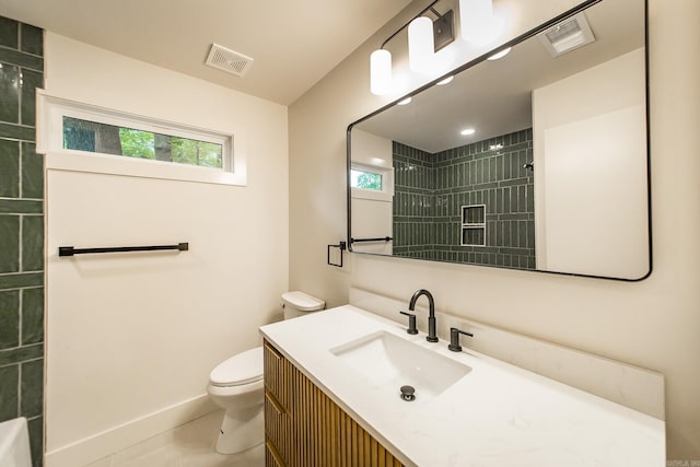 9008 Leatrice Dr, Little Rock, AR 72227 - bathroom with toilet, tile patterned floors, baseboards, vanity, and tiled shower