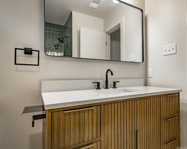9008 Leatrice Dr, Little Rock, AR 72227 - bathroom with vanity and a tile shower