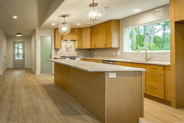 9008 Leatrice Dr, Little Rock, AR 72227 - kitchen with a sink, custom exhaust hood, tasteful backsplash, light countertops, and stainless steel dishwasher