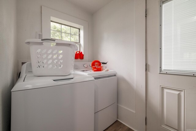 1626 Logan St, Arkadelphia, AR 71923 - laundry area featuring washer and dryer and wood finished floors