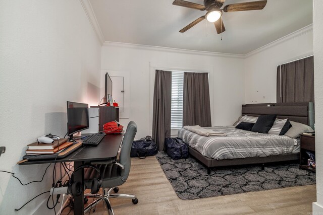 1626 Logan St, Arkadelphia, AR 71923 - bedroom featuring crown molding, wood finished floors, a desk, and a ceiling fan