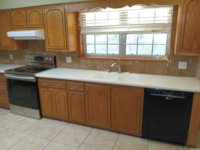 162 Cloverdale, Searcy, AR 72143 - kitchen featuring under cabinet range hood, black dishwasher, stainless steel electric stove, brown cabinets, and decorative backsplash