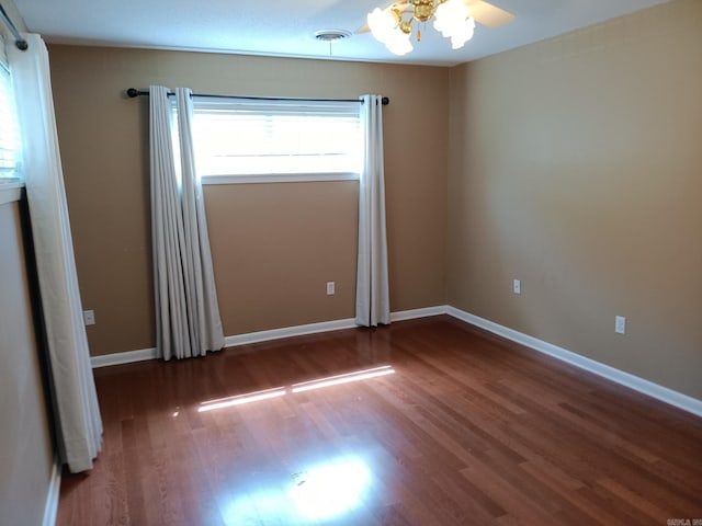 162 Cloverdale, Searcy, AR 72143 - empty room featuring wood finished floors, a ceiling fan, and baseboards