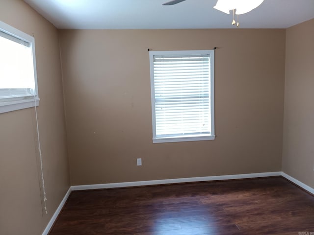 162 Cloverdale, Searcy, AR 72143 - empty room with plenty of natural light and dark wood finished floors