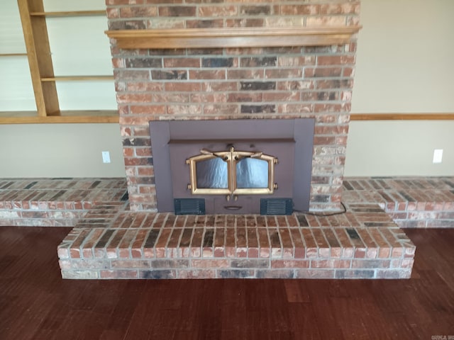 162 Cloverdale, Searcy, AR 72143 - detailed view of a fireplace with raised hearth and wood finished floors