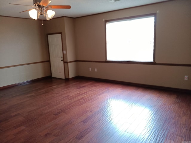 162 Cloverdale, Searcy, AR 72143 - spare room featuring wood finished floors, ceiling fan, and baseboards