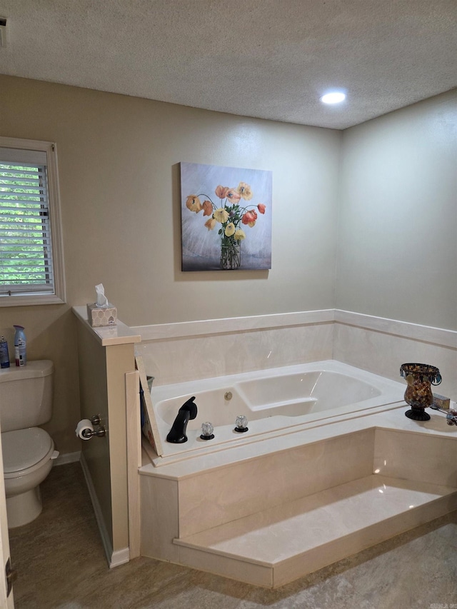 76 Justa Via Way, Hot Springs Village, AR 71909 - full bathroom with toilet, a jetted tub, a textured ceiling, and wood finished floors