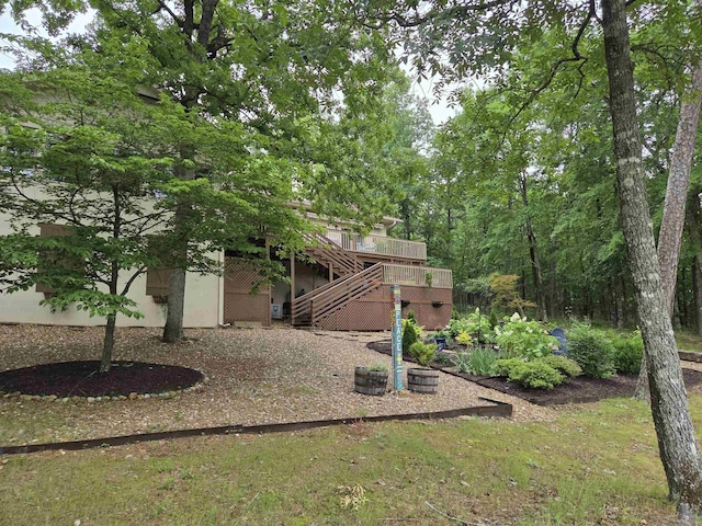 76 Justa Via Way, Hot Springs Village, AR 71909 - view of yard with stairs and a deck
