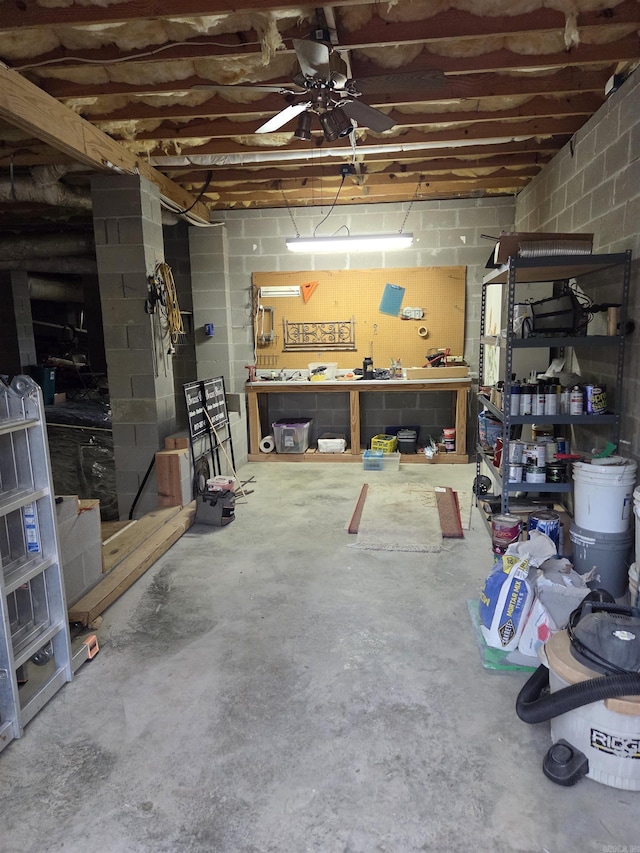 76 Justa Via Way, Hot Springs Village, AR 71909 - basement with a workshop area, concrete block wall, and ceiling fan