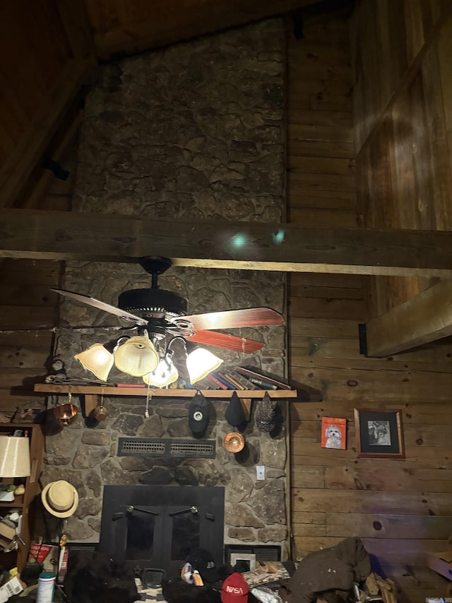 803 Carmichael Rd, Bryant, AR 72022 - detailed view of a fireplace, wooden walls, and a ceiling fan