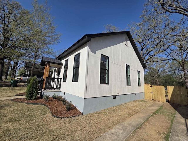 1017 Jefferson, Little Rock, AR 72204 - view of side of home with crawl space, a gate, and fence