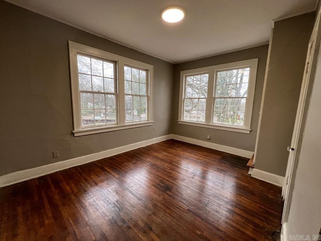 3224 W 11th St, Little Rock, AR 72204 - empty room with baseboards and dark wood-style floors