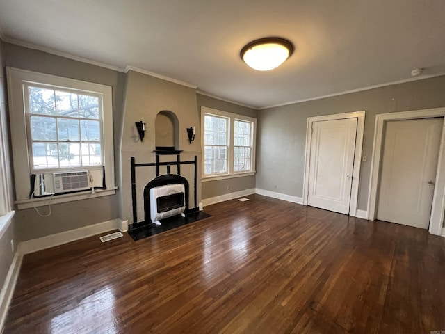 3224 W 11th St, Little Rock, AR 72204 - unfurnished living room with dark wood-style flooring, crown molding, baseboards, cooling unit, and a fireplace with flush hearth