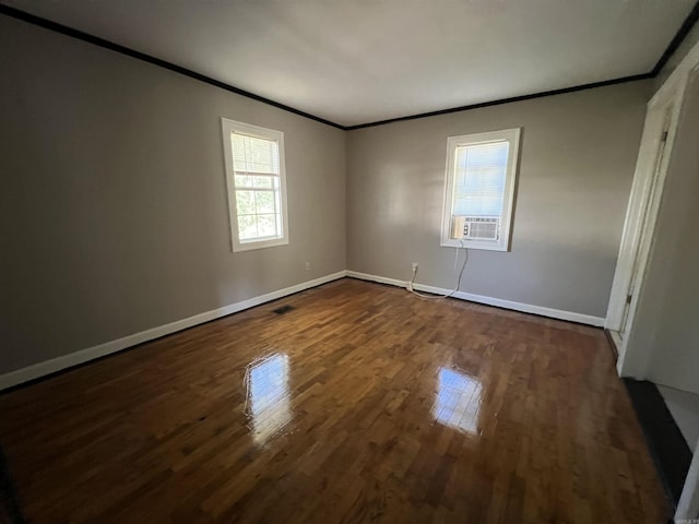 3224 W 11th St, Little Rock, AR 72204 - unfurnished room with ornamental molding, dark wood-type flooring, and baseboards