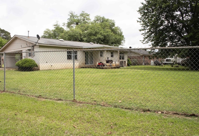 100 Elizabeth St, Prescott, AR 71857 - rear view of property with an attached carport and driveway
