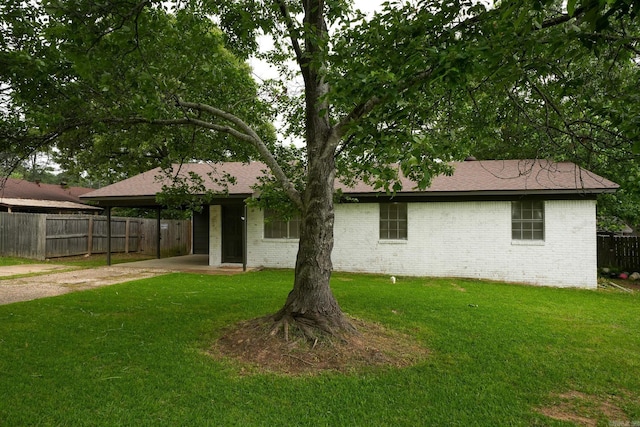 3516 Vickie Dr, Bryant, AR 72022 - ranch-style house with brick siding, a carport, concrete driveway, and roof with shingles