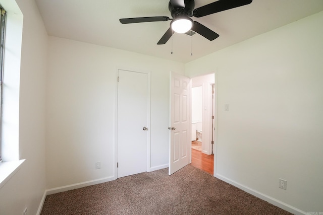 3516 Vickie Dr, Bryant, AR 72022 - unfurnished bedroom featuring carpet flooring, baseboards, and ceiling fan