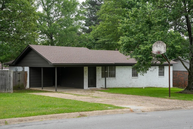 3516 Vickie Dr, Bryant, AR 72022 - ranch-style home with a shingled roof, driveway, brick siding, and a carport