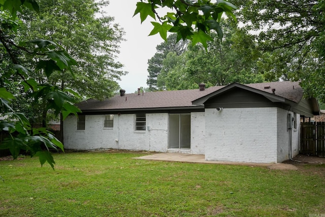3516 Vickie Dr, Bryant, AR 72022 - rear view of property featuring brick siding, a shingled roof, and a patio area