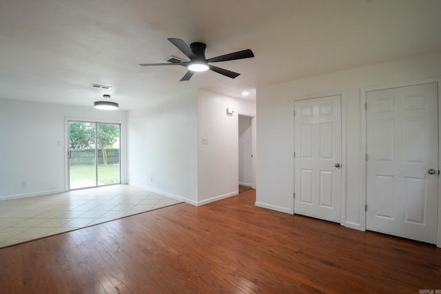 3516 Vickie Dr, Bryant, AR 72022 - spare room with baseboards, a ceiling fan, and wood finished floors