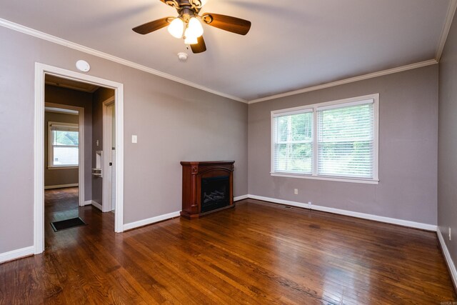 15 Coolwood Dr, Little Rock, AR 72202 - unfurnished living room with wood finished floors, baseboards, a fireplace, ornamental molding, and ceiling fan