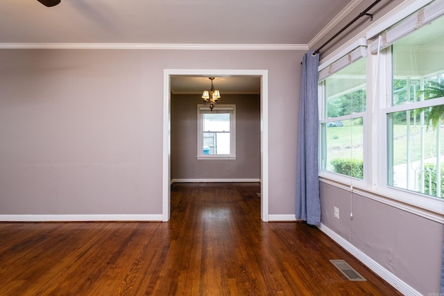 15 Coolwood Dr, Little Rock, AR 72202 - unfurnished room with a chandelier, baseboards, crown molding, and wood finished floors