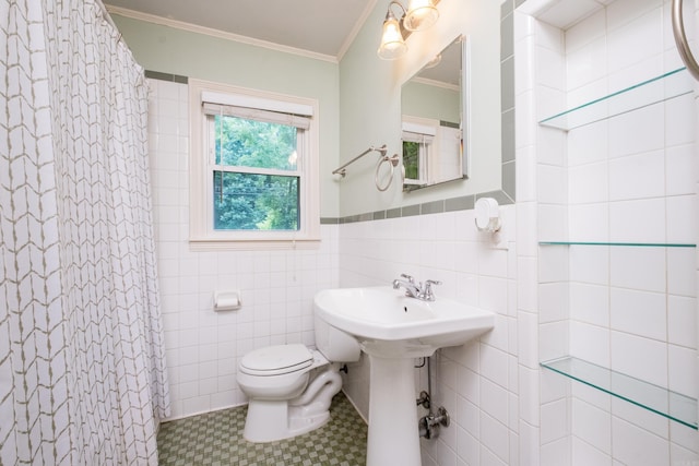 15 Coolwood Dr, Little Rock, AR 72202 - bathroom with tile walls, toilet, ornamental molding, a shower with curtain, and a wainscoted wall