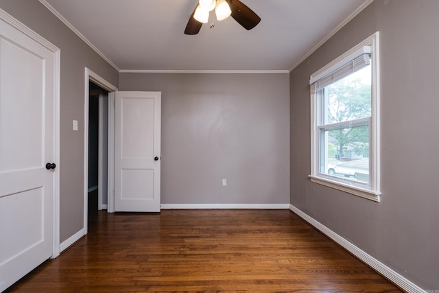 15 Coolwood Dr, Little Rock, AR 72202 - spare room featuring crown molding, dark wood finished floors, a ceiling fan, and baseboards
