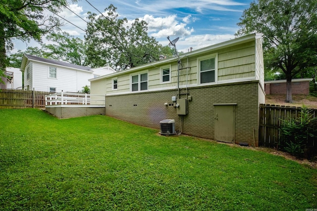 15 Coolwood Dr, Little Rock, AR 72202 - rear view of property with brick siding and central AC unit