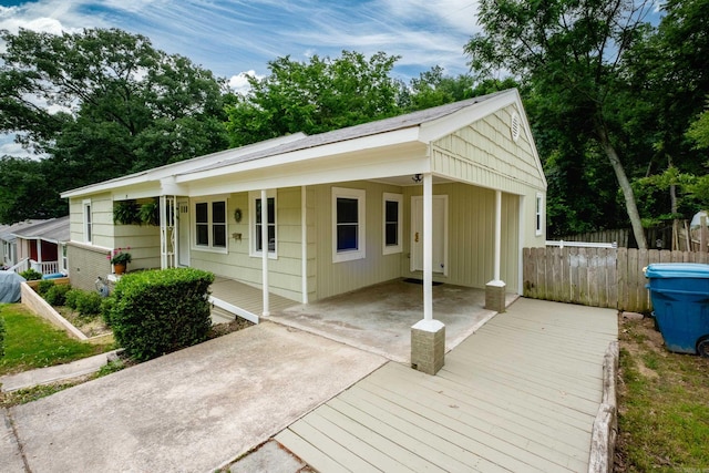 15 Coolwood Dr, Little Rock, AR 72202 - deck featuring fence and a carport