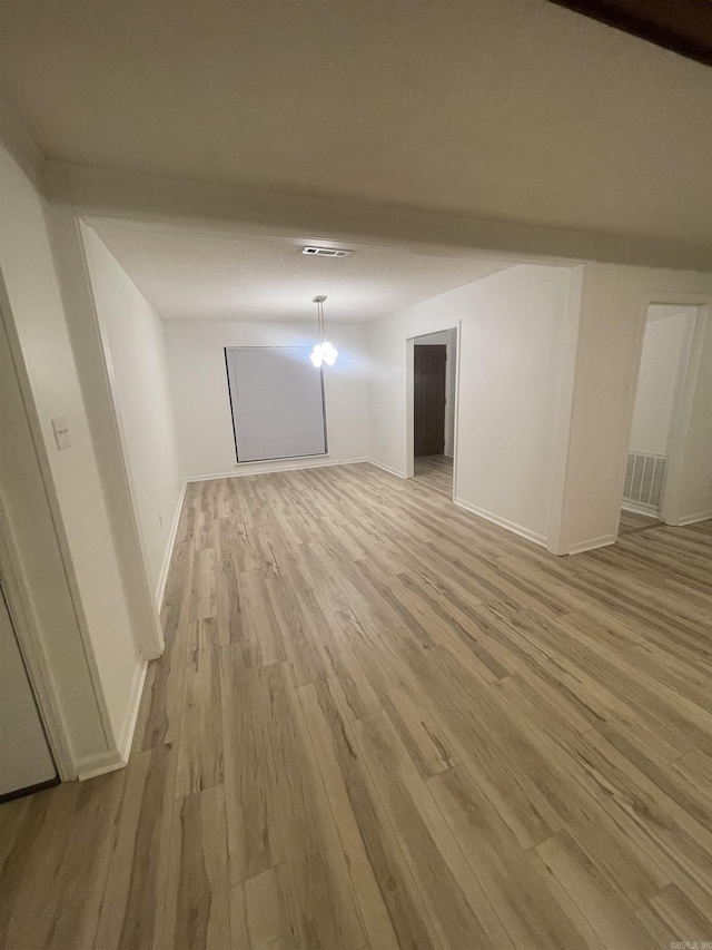 11808 Saint Charles Blvd, Little Rock, AR 72211 - empty room featuring light wood-style floors and baseboards