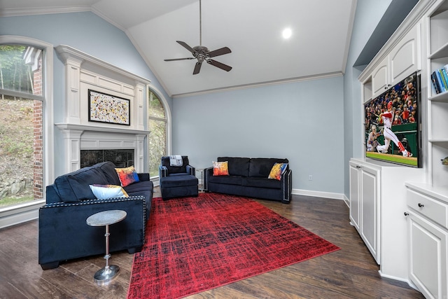 110 Clervaux Cir, Little Rock, AR 72223 - living room with vaulted ceiling, ornamental molding, ceiling fan, a fireplace, and dark wood-type flooring