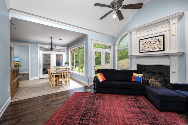 110 Clervaux Cir, Little Rock, AR 72223 - living area featuring wood finished floors, french doors, ornamental molding, vaulted ceiling, and healthy amount of natural light