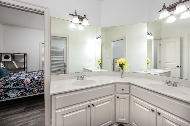 110 Clervaux Cir, Little Rock, AR 72223 - bathroom featuring connected bathroom, wood finished floors, and double vanity