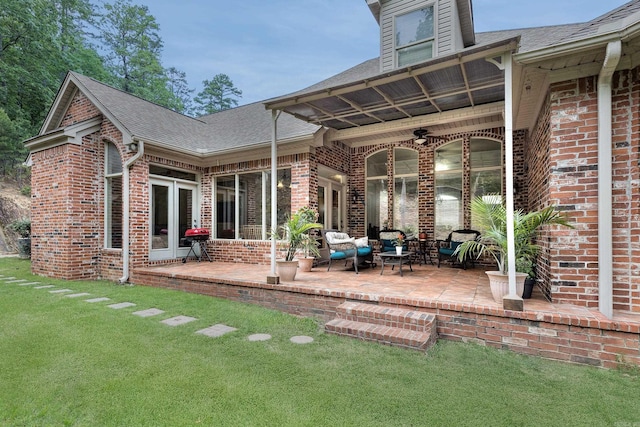 110 Clervaux Cir, Little Rock, AR 72223 - back of house featuring brick siding, a ceiling fan, and a patio area