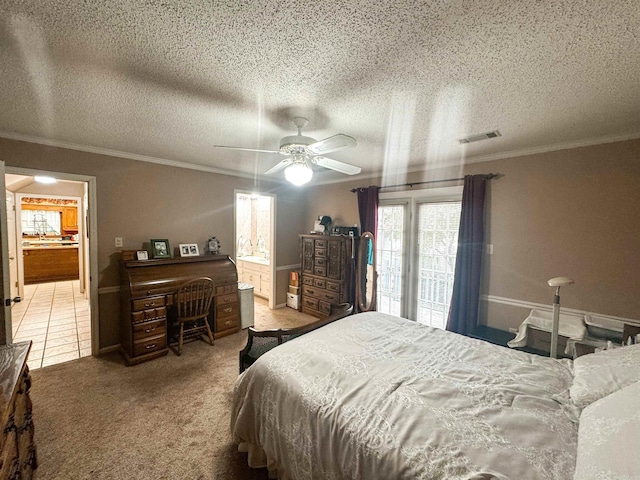 53 White Oak Cir, Searcy, AR 72143 - carpeted bedroom with ornamental molding, multiple windows, a textured ceiling, ensuite bath, and a ceiling fan