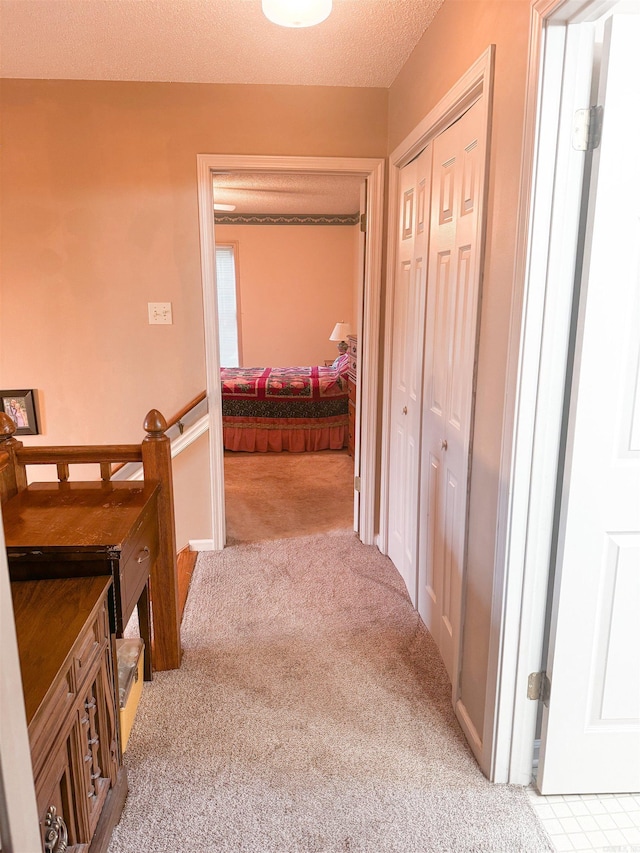 53 White Oak Cir, Searcy, AR 72143 - corridor featuring carpet floors and a textured ceiling