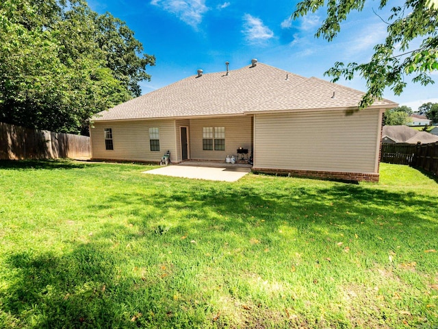 1808 Hidden Crk, Sherwood, AR 72120 - back of property featuring a patio and a shingled roof