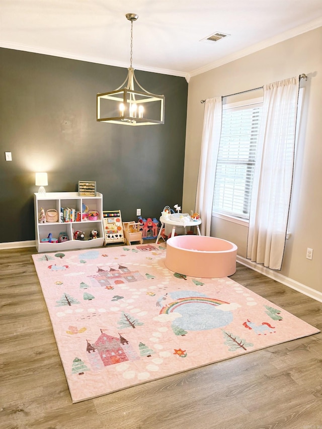 1808 Hidden Crk, Sherwood, AR 72120 - game room featuring crown molding, a chandelier, wood finished floors, and baseboards