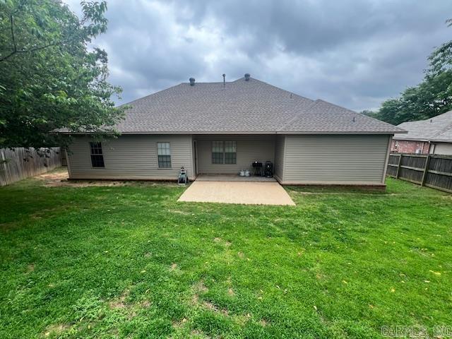 1808 Hidden Crk, Sherwood, AR 72120 - rear view of property featuring a patio area and a shingled roof