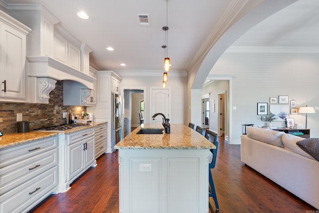 43 Tournay Cir, Little Rock, AR 72223 - kitchen with a sink, appliances with stainless steel finishes, white cabinetry, tasteful backsplash, and recessed lighting