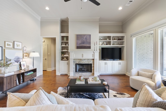 43 Tournay Cir, Little Rock, AR 72223 - living room featuring a ceiling fan, wood finished floors, ornamental molding, a fireplace, and baseboards