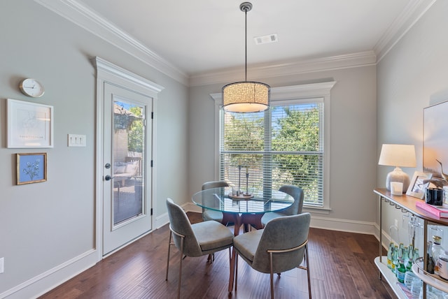 43 Tournay Cir, Little Rock, AR 72223 - dining area featuring dark wood-style flooring, ornamental molding, and baseboards