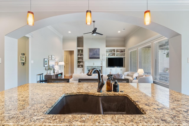 43 Tournay Cir, Little Rock, AR 72223 - kitchen with a sink, ceiling fan, pendant lighting, ornamental molding, and recessed lighting